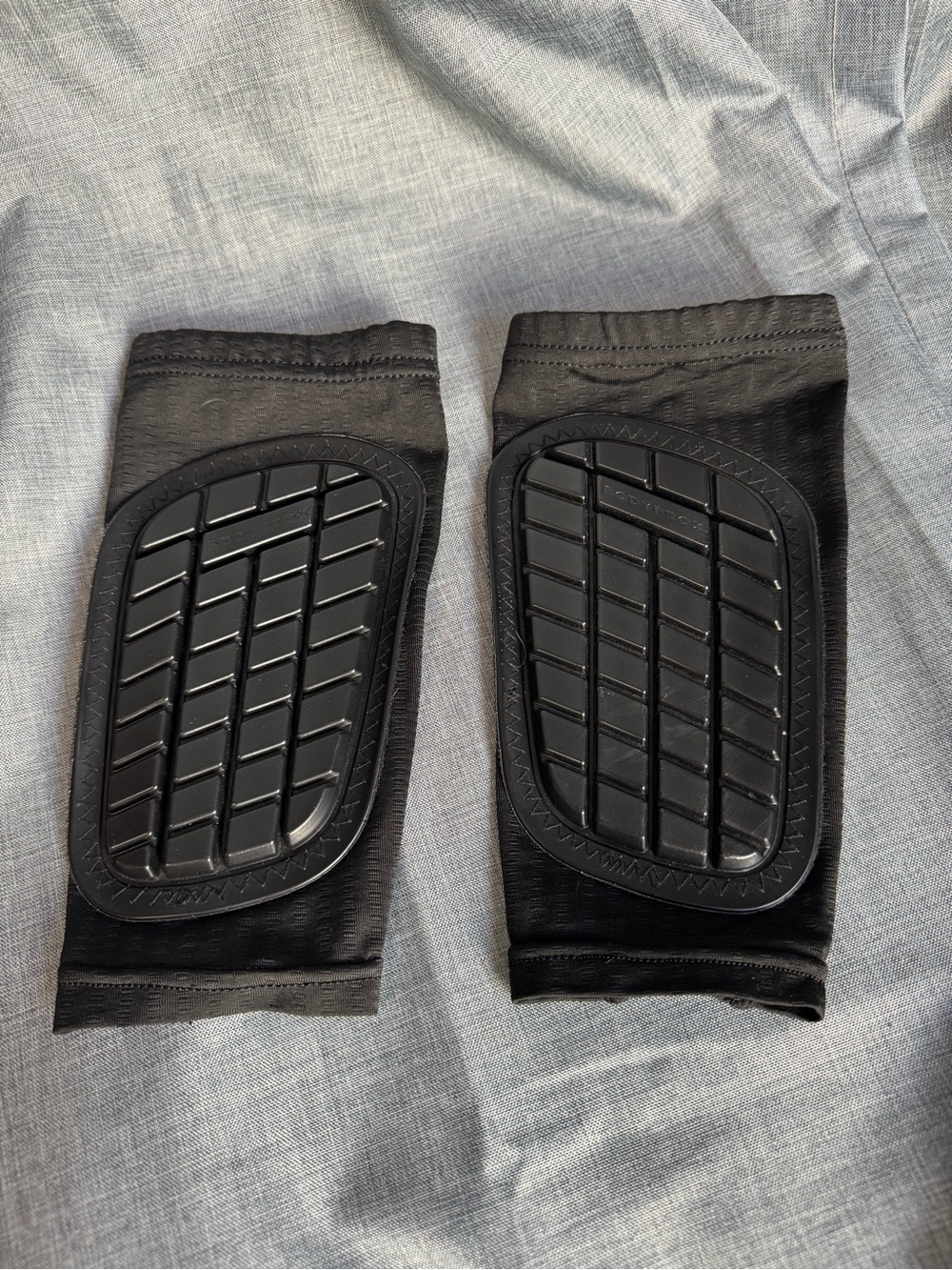 Bodyprox soccer shin guards with integrated compression sleeves